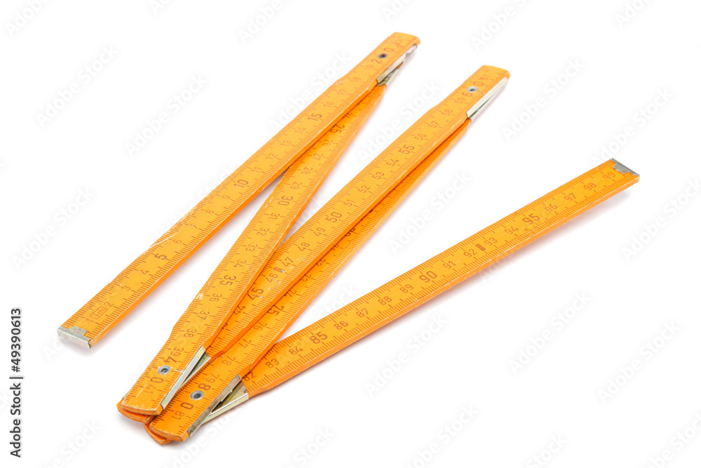 Folding wooden meter isolated on white background. Folding wooden meter isolated on white background.