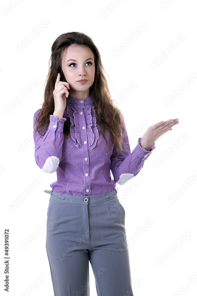 Angry businesswoman talking on the cellphone isolated on white Angry businesswoman talking on the cellphone isolated on white