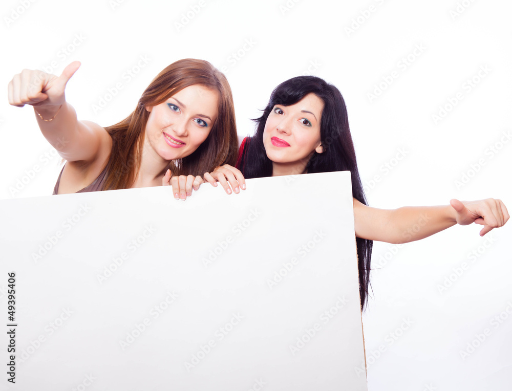 Two girls with banner. Two girls with banner.