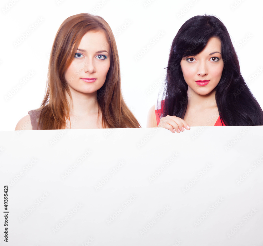 Two girls with banner. Two girls with banner.