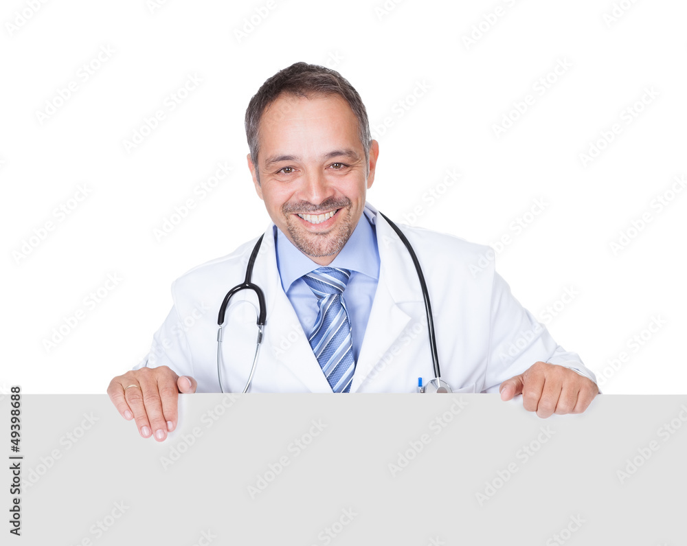 Portrait Of A Doctor Holding Blank Placard Portrait Of A Doctor Holding Blank Placard