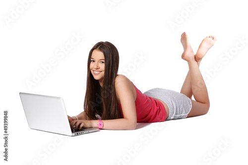 relaxed teenager with laptop