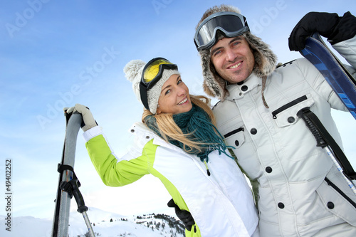 Cheerful couple enjoying winter vacation