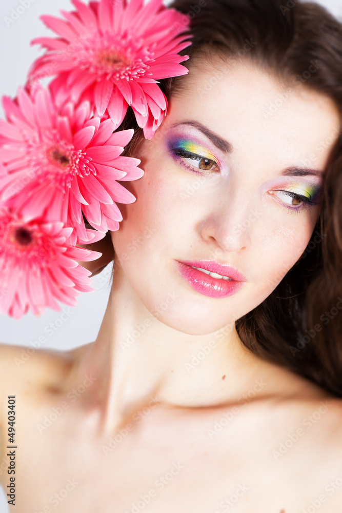 Girl with gerbera flower in studio Girl with gerbera flower in studio