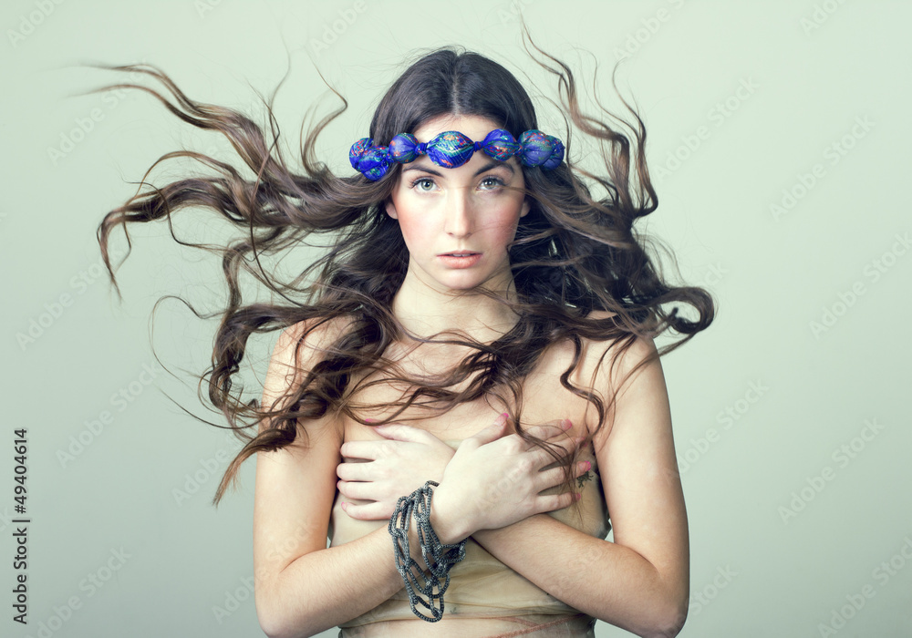 Beautiful young woman in the image of spring. Beautiful young woman in the image of spring.