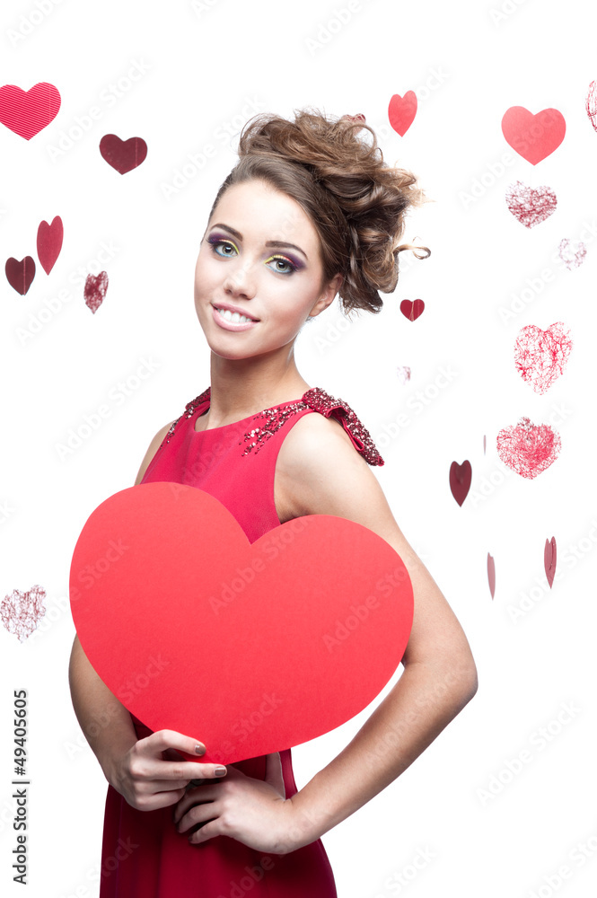 young cheerful woman holding red paper heart young cheerful woman holding red paper heart