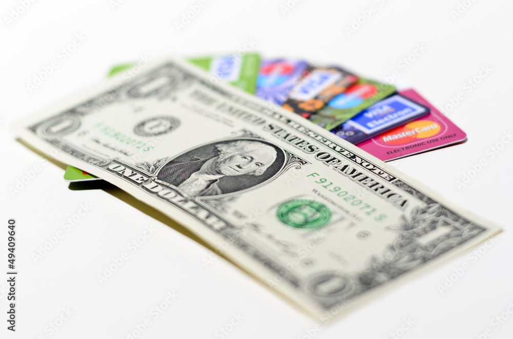 Credit card and dollars Credit card and dollars