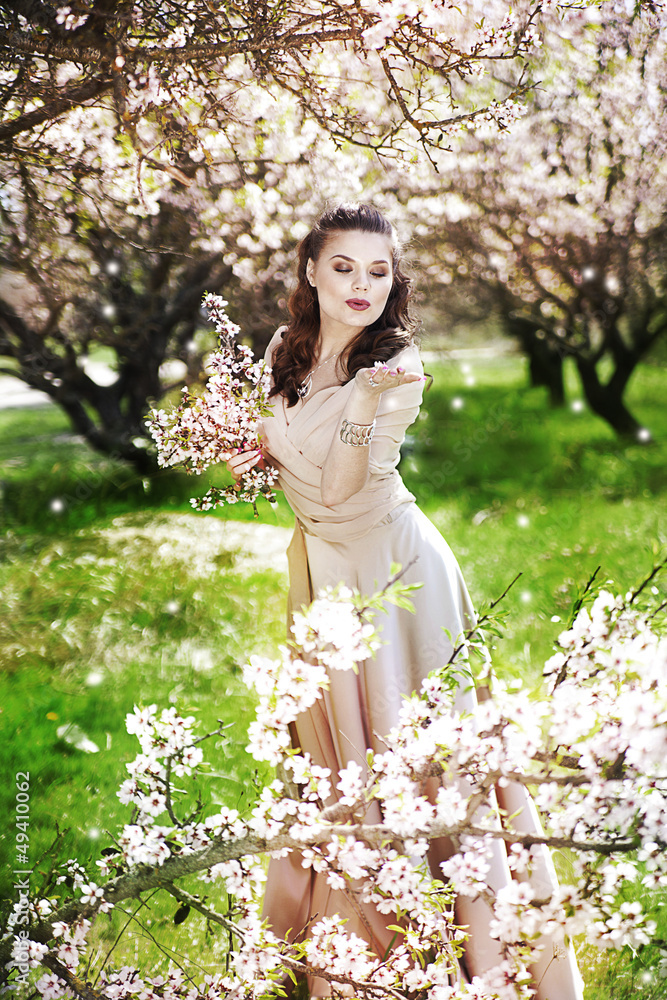 Beautiful girl in blossom garden Beautiful girl in blossom garden