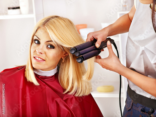 Woman at hairdresser.