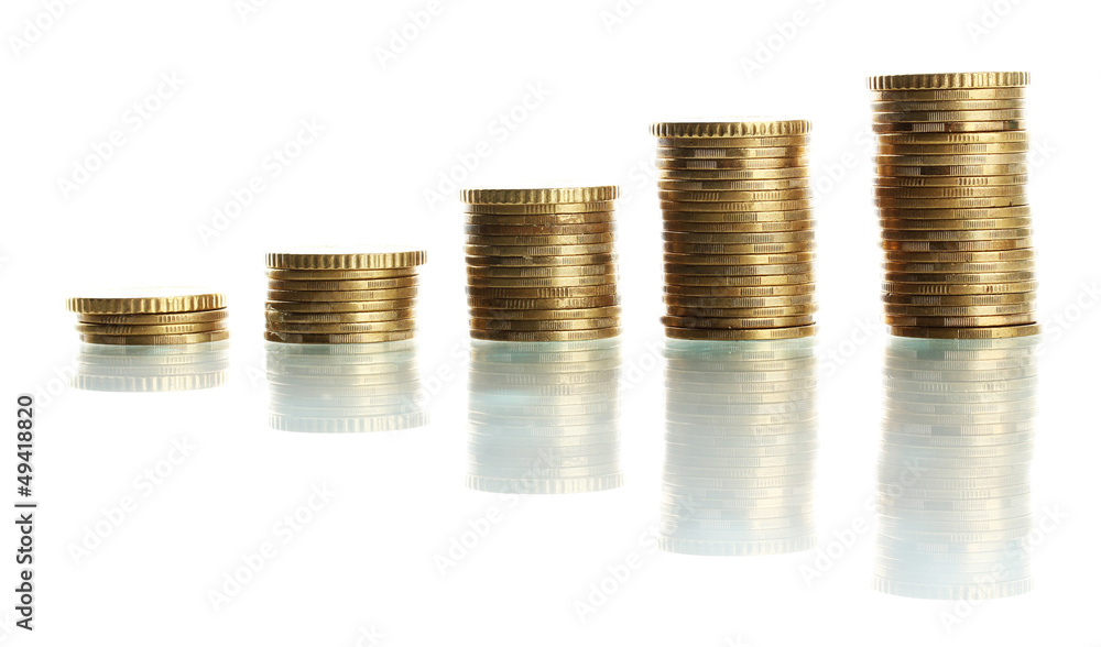 Many coins in columns isolated on white Many coins in columns isolated on white