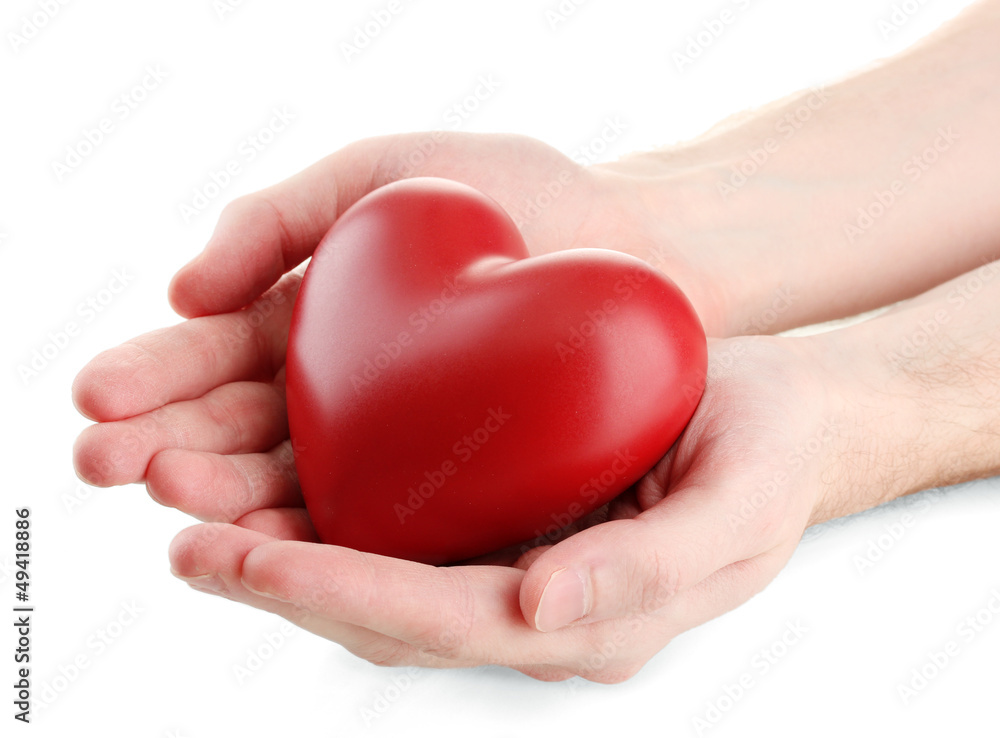 Red heart in man hands, isolated on white