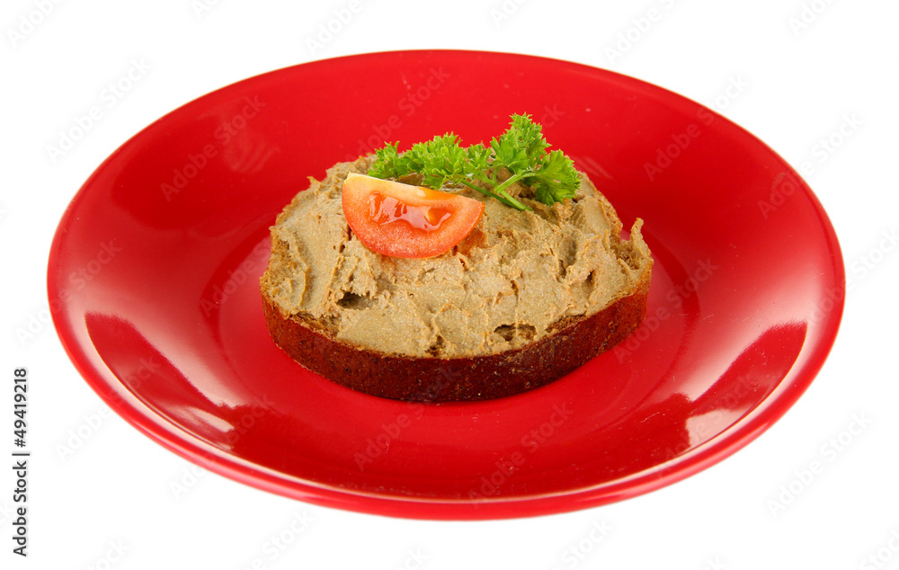 Toasted bread with pate on color plate, isolated on white