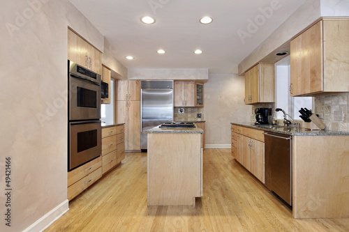 Kitchen with wood cabinetry