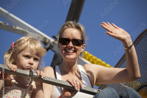 Mother and Daughter on a Ride at the Fair © thepoeticimage