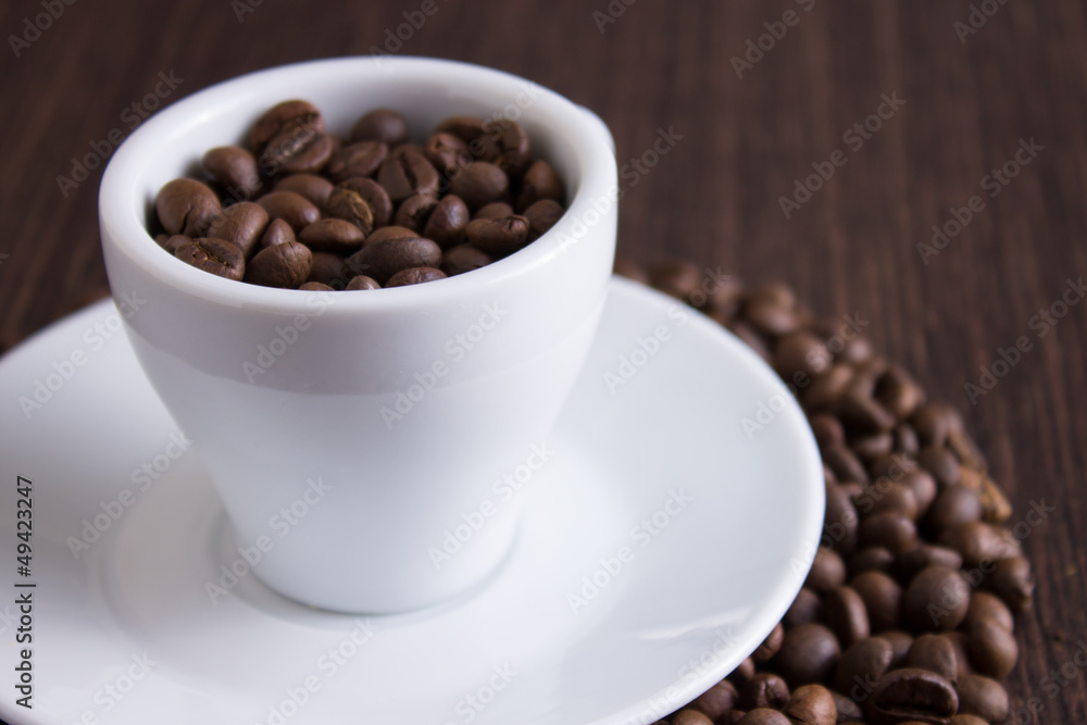 coffee beans in white cup coffee beans in white cup