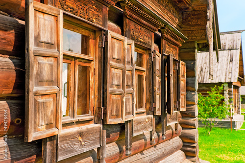 Windows with wooden architraves and shutters