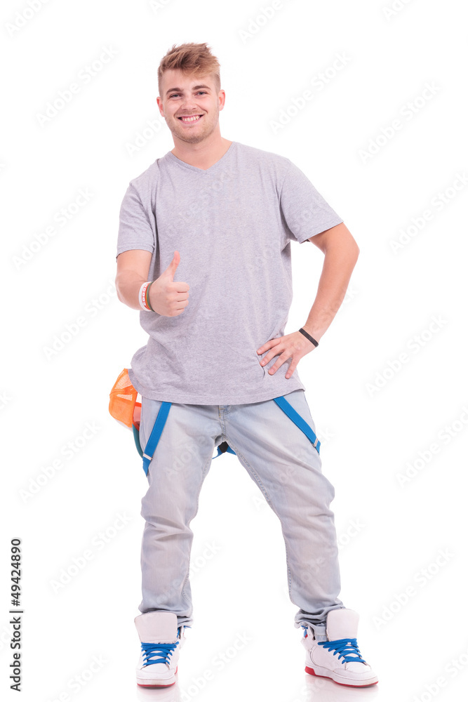 casual man shows thumb up casual man shows thumb up