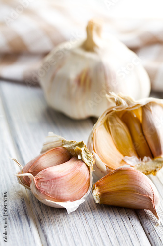 fresh garlic on wooden table