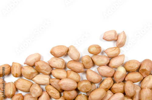 Raw peanuts isolated on white background