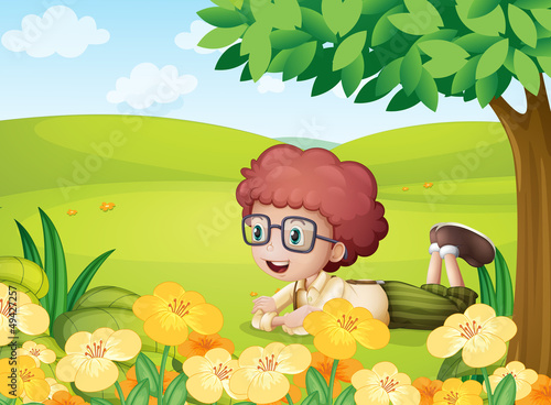 A boy relaxing in the hills