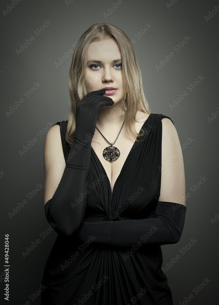Fototapeta premium blond woman with elegant black dress