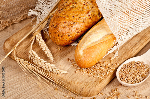 Fresh baked traditional bread and wheat