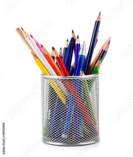 Closeup of large group of pencils in holder over white backgroun