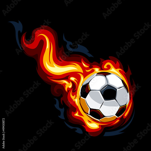 Burning soccer ball on black background