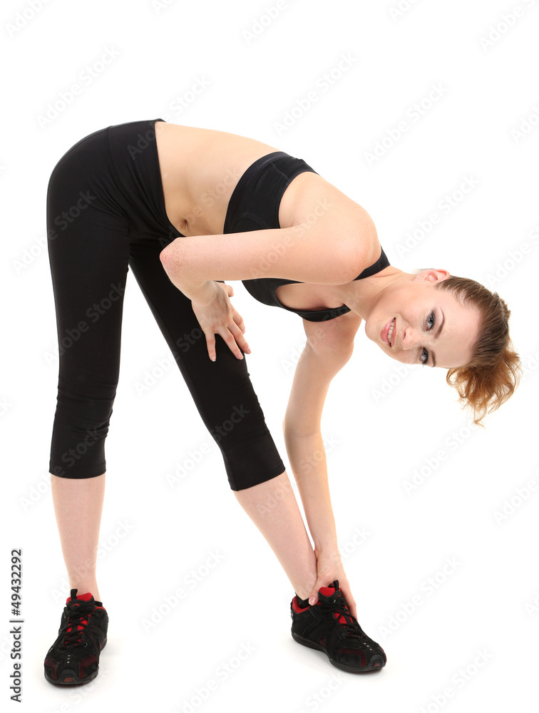 Young woman doing fitness exercises isolated on white Young woman doing fitness exercises isolated on white