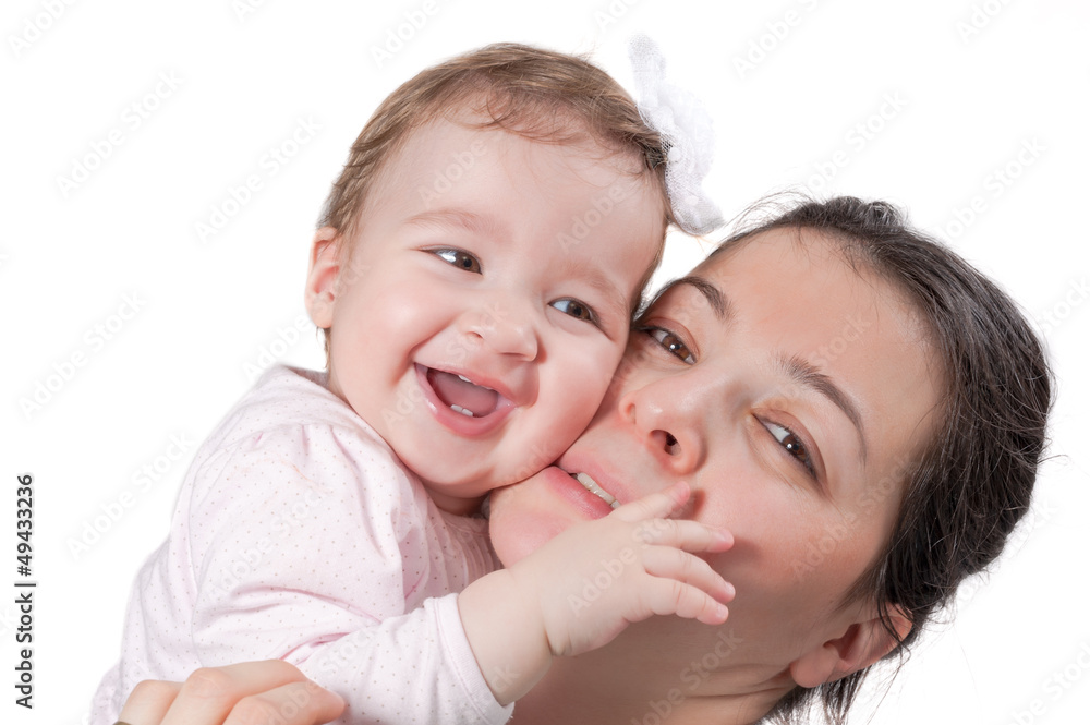 Isolated happy baby girl and mother smiling on white background Isolated happy baby girl and mother smiling on white background