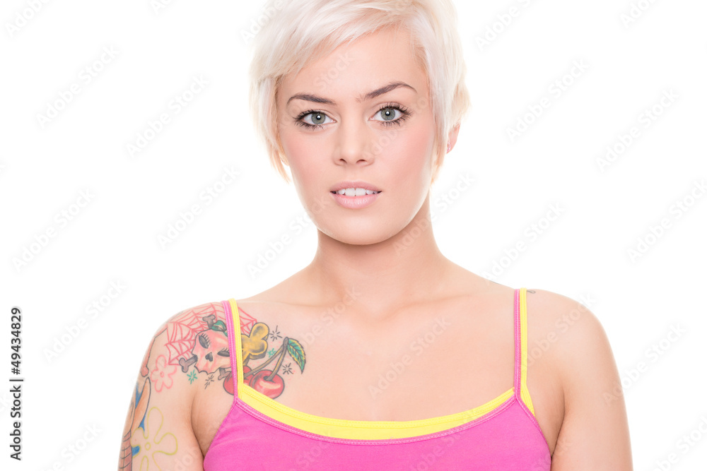 Young and smiling woman in front of white background