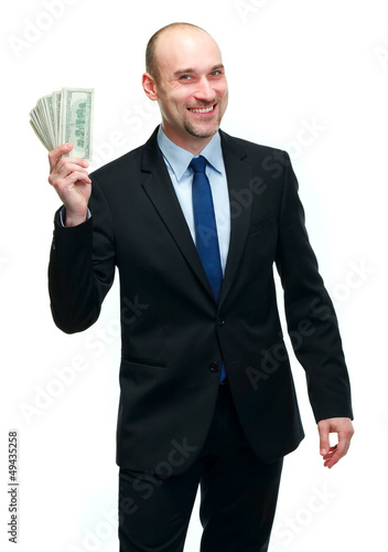 Businessman holding dollar bills