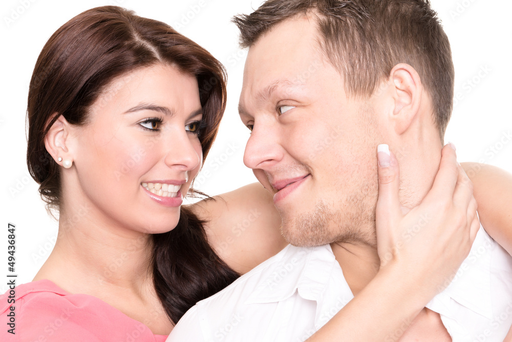 Young and happy couple in front of white background Young and happy couple in front of white background
