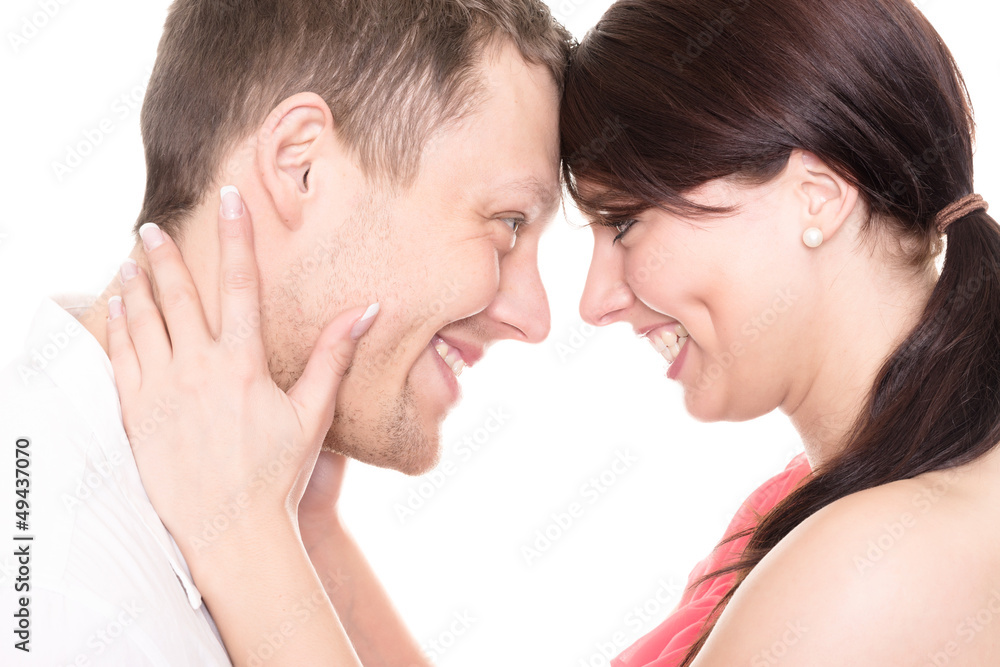 Young and happy couple in front of white background Young and happy couple in front of white background