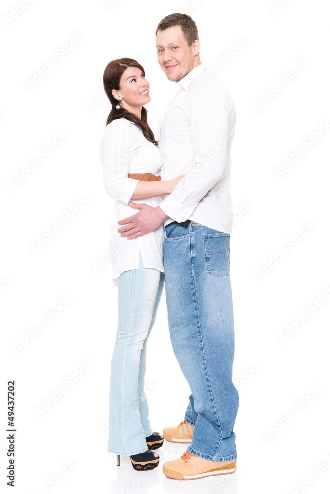 Young and happy couple in front of white background Young and happy couple in front of white background