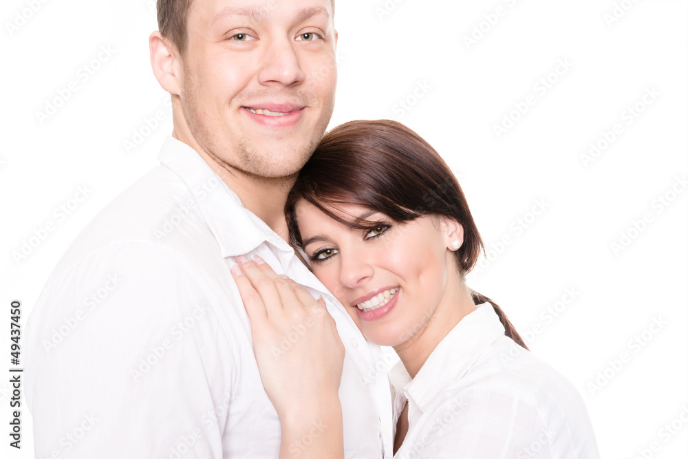Young and happy couple in front of white background Young and happy couple in front of white background