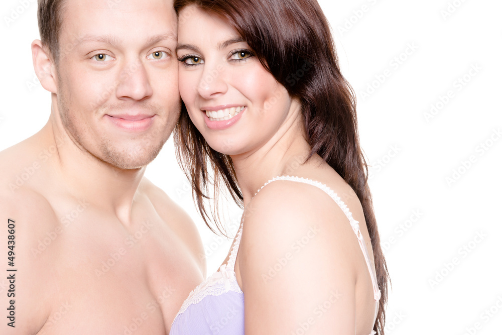 Young and happy couple in front of white background Young and happy couple in front of white background