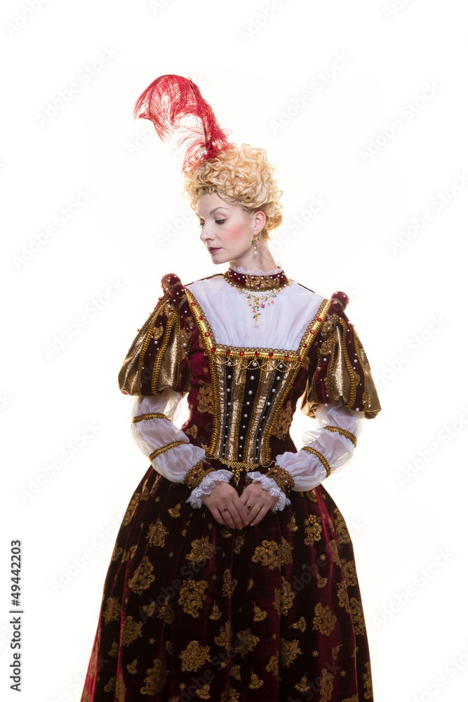 Haughty queen in royal dress isolated on white