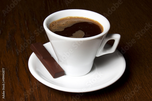 Coffee beans and coffee with chocolate candy