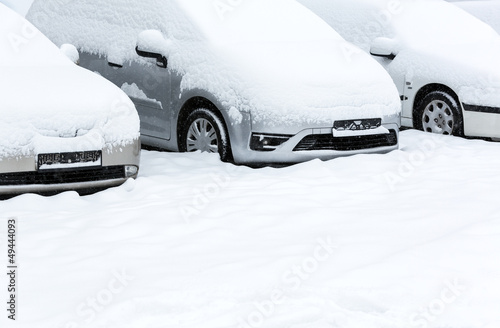 Parked cars after snowfall