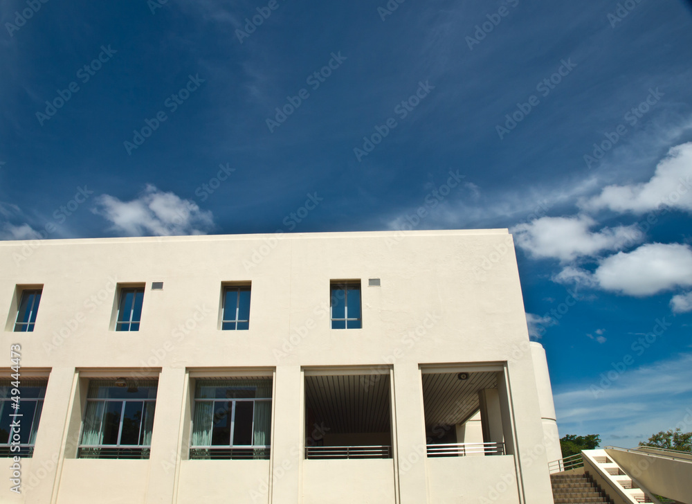 Facade windows of office building on blue sky