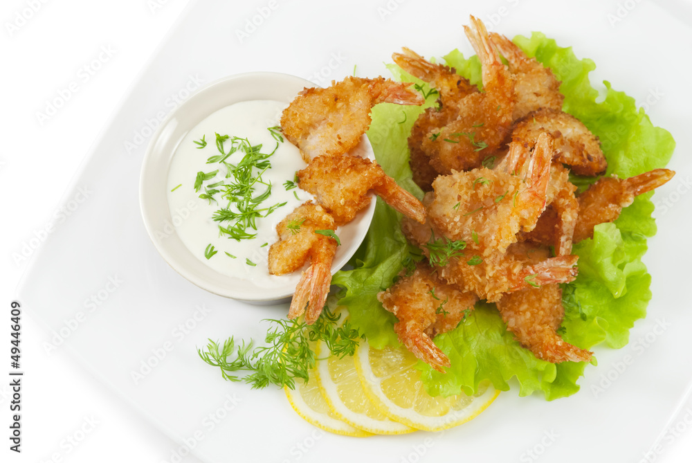 Fried prawns in coconut breading with dipping sauce Fried prawns in coconut breading with dipping sauce