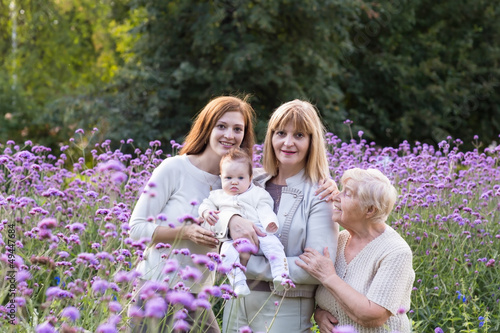 Four generations of women in a beautiful lavender field