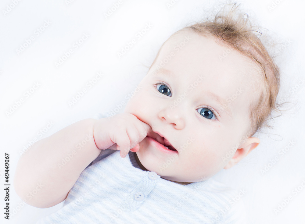 Beautiful baby girl with big blue eyes Beautiful baby girl with big blue eyes