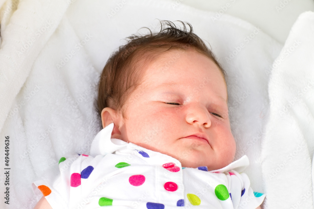 Newborn baby taking a nap in stroller sunny summer day Newborn baby taking a nap in stroller sunny summer day