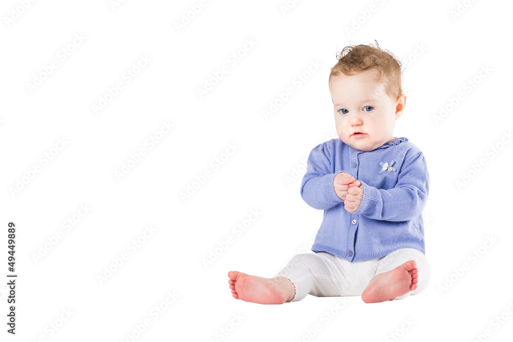 Beautiful baby girl wearing a purple sweater Beautiful baby girl wearing a purple sweater