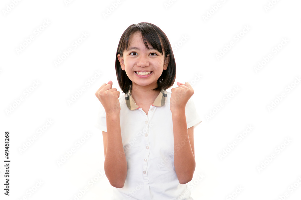 ガッツポーズをする笑顔の女の子