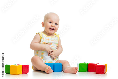 smiling child playing with ...