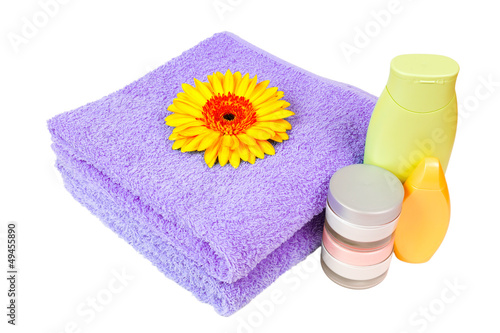 lilac towel, nail polish, gerbera