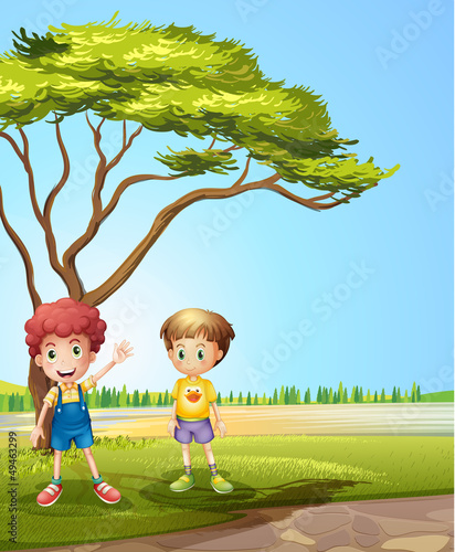 Two young boys near the road